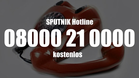 Ein rotes Telefon mit der Telefonnummer von MDR SPUTNIK: 08000 21 0000